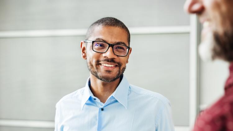 Smiling man wearing glasses
