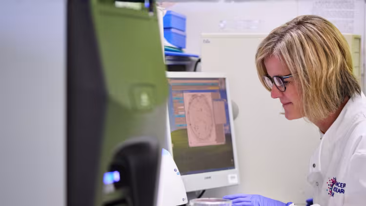 Scientist looking at computer screen