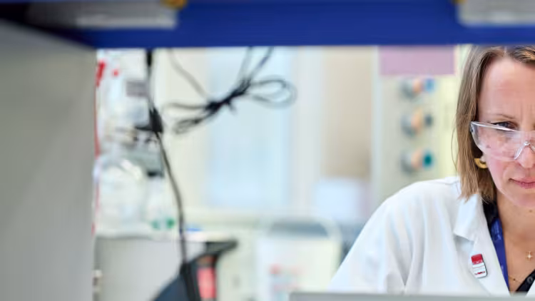 Scientist working at lab bench