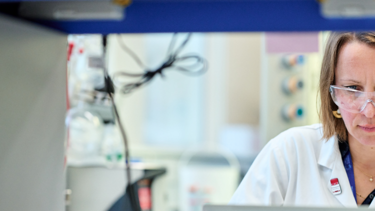 Scientist working at lab bench