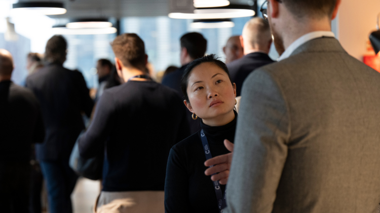 Woman speaking to man