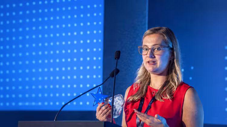 Jess Corry speaking at the 2025 Innovation and Entrepreneurship Awards