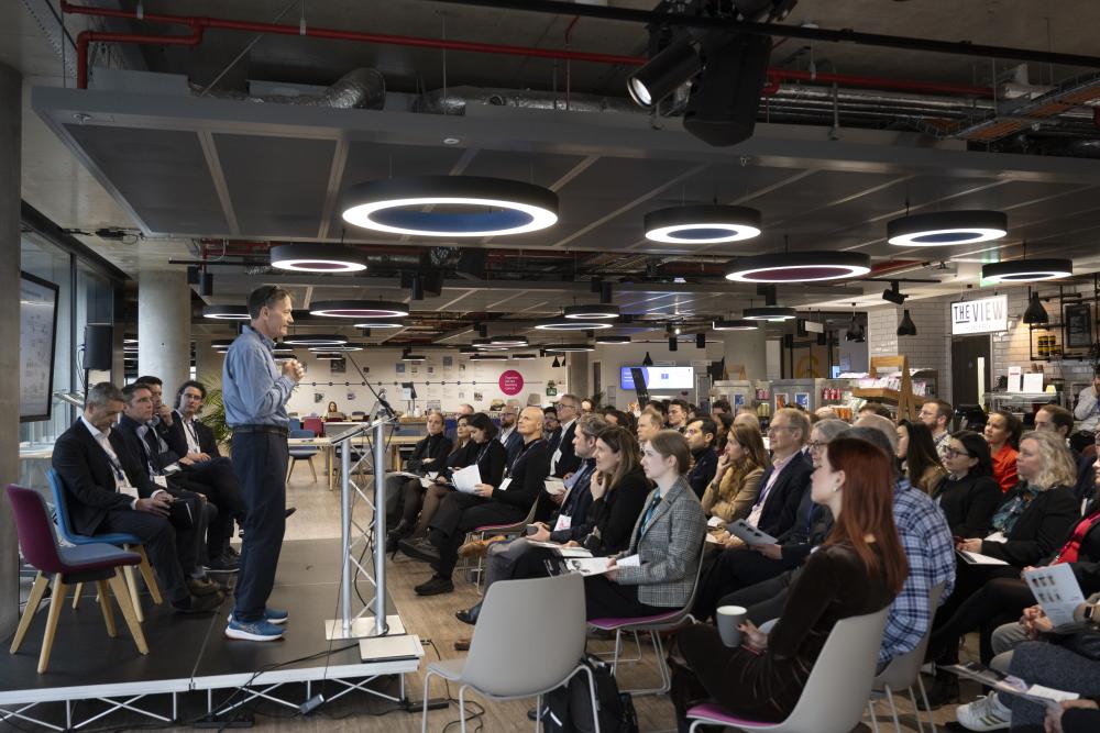 Robin Carr, CEO of Myricx, speaks at the Investor Networking Breakfast in November 2024